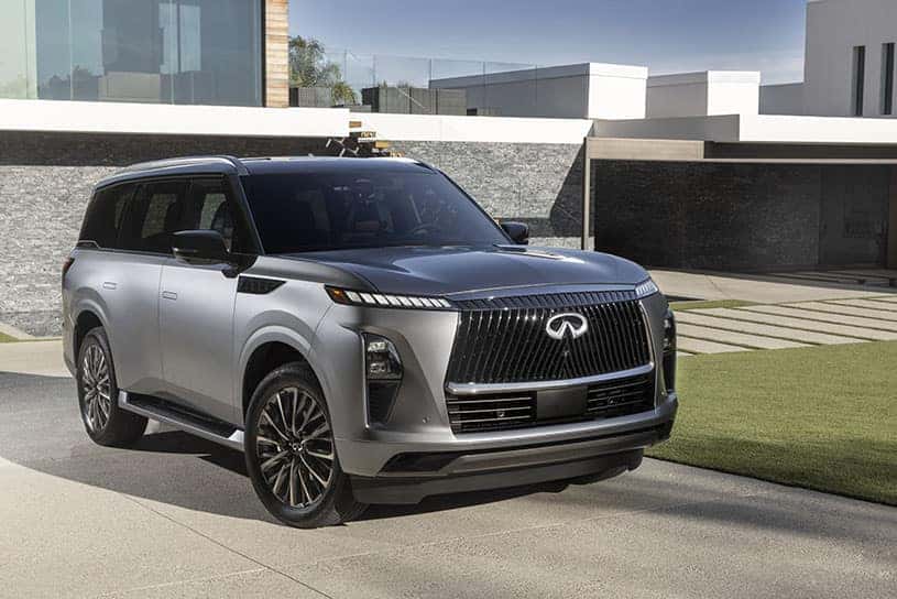 An SUV parked at a modern home